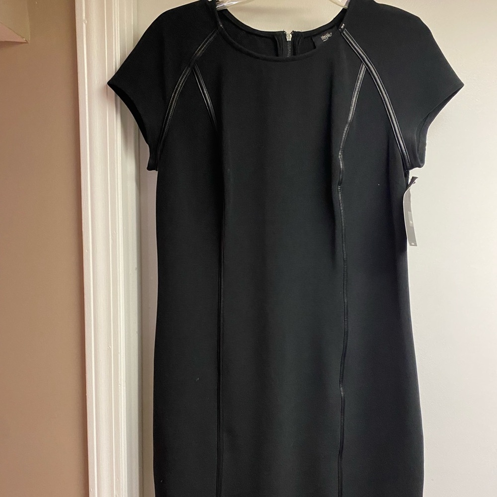 Black dress with leather detail. Short sleeve, knee length
